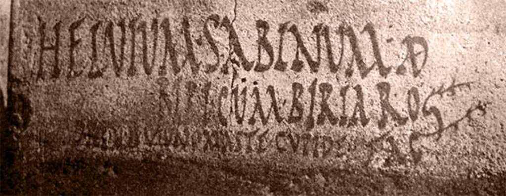 II.1.12 Pompeii. Found in 1958. Wall on south side of entrance doorway.
Inscription below Mercury and Bacchus painting.

HELVIVM SABINVM AED
BIRI CVM BIRIA ROG
D. R. P. V. B. O. V. F. ONOMASTE CVPIDE FAC       [CIL IV 9885]
See Corpus Inscriptionum Latinarum Vol. IV, Supp P3, F4, 1970. Berlin:De Gruyter, p. 129. 

According to Epigraphik-Datenbank Clauss/Slaby (See www.manfredclauss.de), it read –

Helvium  Sabinum  aed(ilem)
Biri  cum  Biria  rog(ant)
d(ignum)  r(ei)  p(ublicae)  v(irum)  b(onum)  o(ro)  v(os)  f(aciatis)  Onomaste  cupide  fac(iatis)       [CIL IV 9885]

According to Cooley this translates as 
Biri(us) with Biria ask you to elect Helvius Sabinus aedile, a good man, worthy of public office: Onomastus, vote for him eagerly. 
See Cooley, A. and M.G.L., 2004. Pompeii: A Sourcebook. London: Routledge, F52, p. 122.
