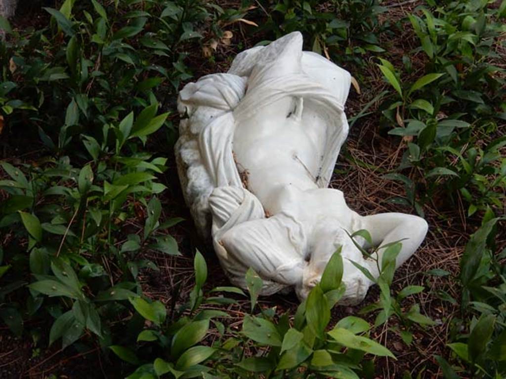 II.2.2 Pompeii. May 2016. Room “l”, garden. 
Statue of Hermaphrodite found near the wall at the south end of the garden. Photo courtesy of Buzz Ferebee.

