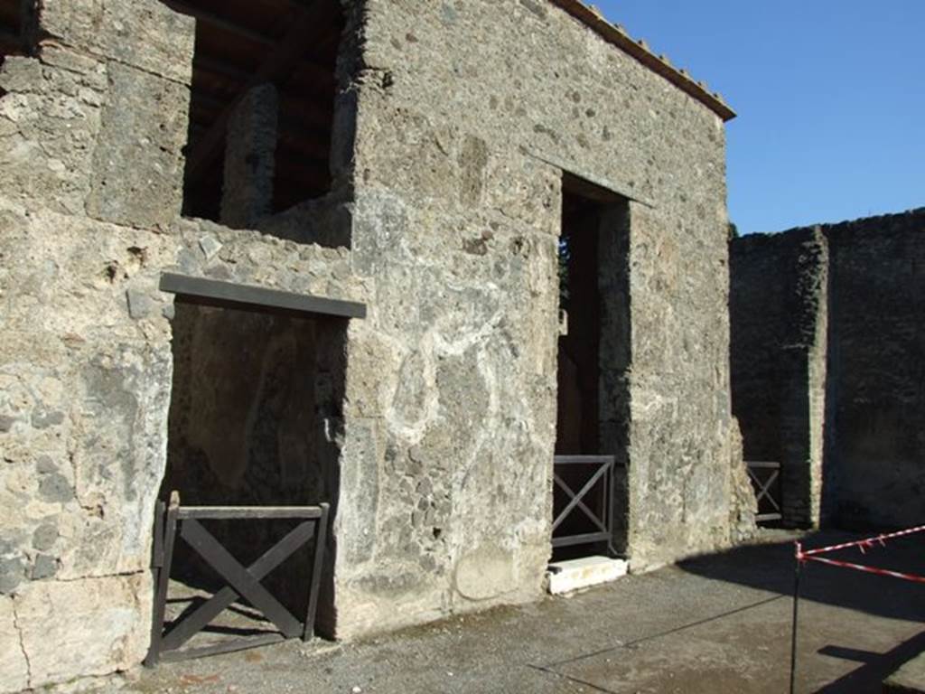 II.2.2 Pompeii. March 2009. North-east corner of atrium 2, with doorway to II.2.3, and doorway to room 3.