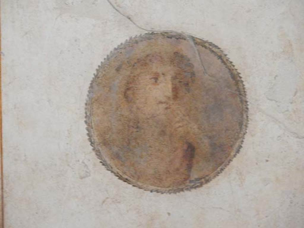 II.3.3 Pompeii. May 2016. Room 4, painted medallion from north end of east wall. Photo courtesy of Buzz Ferebee