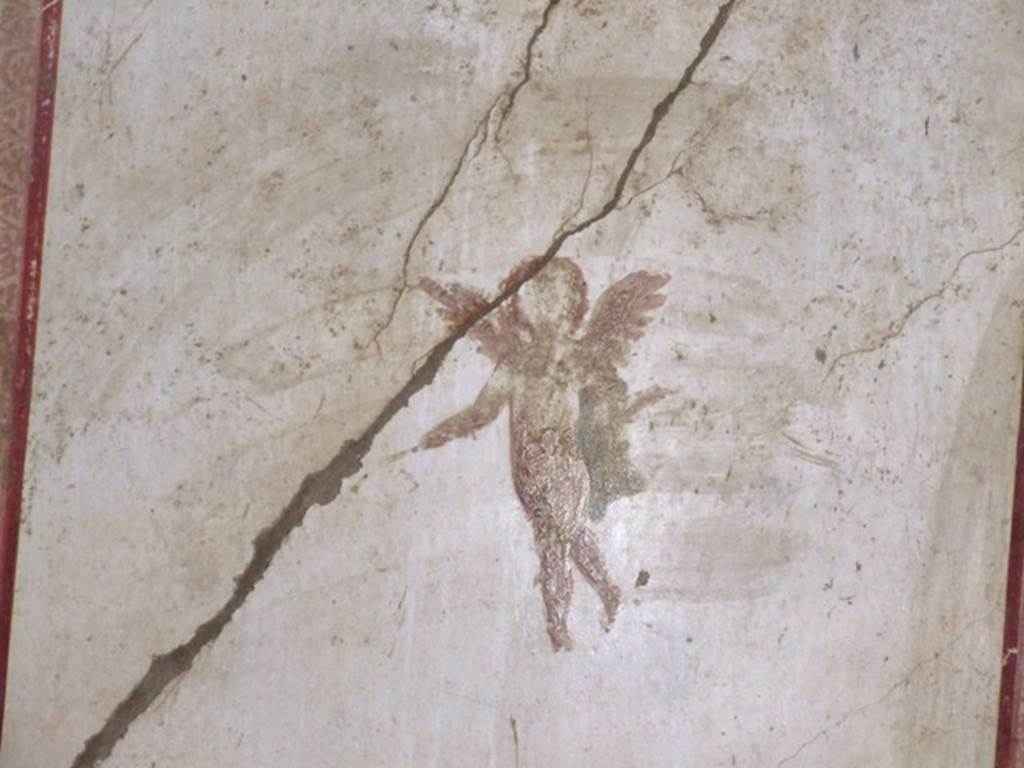II.3.3 Pompeii. March 2009. Room 4, south wall of cubiculum, with painting of flying cherub.