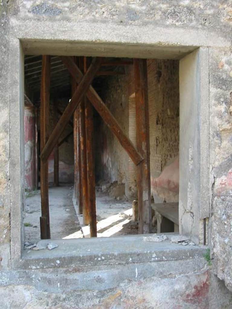 II.4.7 Pompeii. May 2003. Looking west through window into II.4.6. Photo courtesy of Nicolas Monteix.