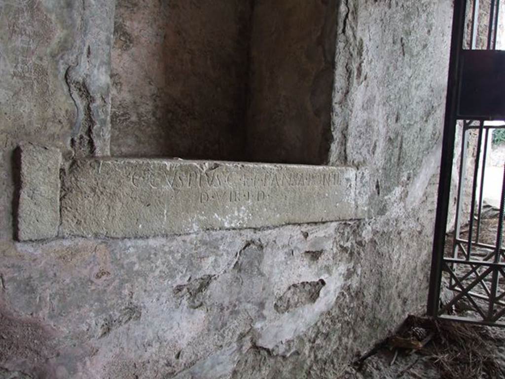 II.6 Pompeii. December 2006. Inscription from west side of corridor of Amphitheatre. The inscription reads –
C. CVSPIVS C. F. PANSA PONTIF.
D. VIR I. D.
One of two inscriptions to father and son, Cuspius Pansa.  
They restored the Amphitheatre at their own expense after the earthquake of AD62.
According to Pagano and Prisciandaro, this read –
C(aius) Cuspius C(ai) f(ilius) {F} Pansa pontif(ex)
d(uum) vir i(ure) d(icundo)    [CIL X 859]
See Pagano, M.  and Prisciandaro, R., 2006. Studio sulle provenienze degli oggetti rinvenuti negli scavi borbonici del regno di Napoli.  Naples : Nicola Longobardi. (p.110)


