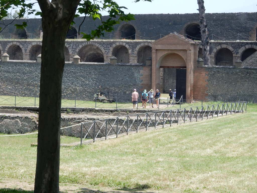 II.7 Pompeii. June 2019. Looking east towards entrance doorway at II.7.3, from south-west corner of pool.
Photo courtesy of Buzz Ferebee.
