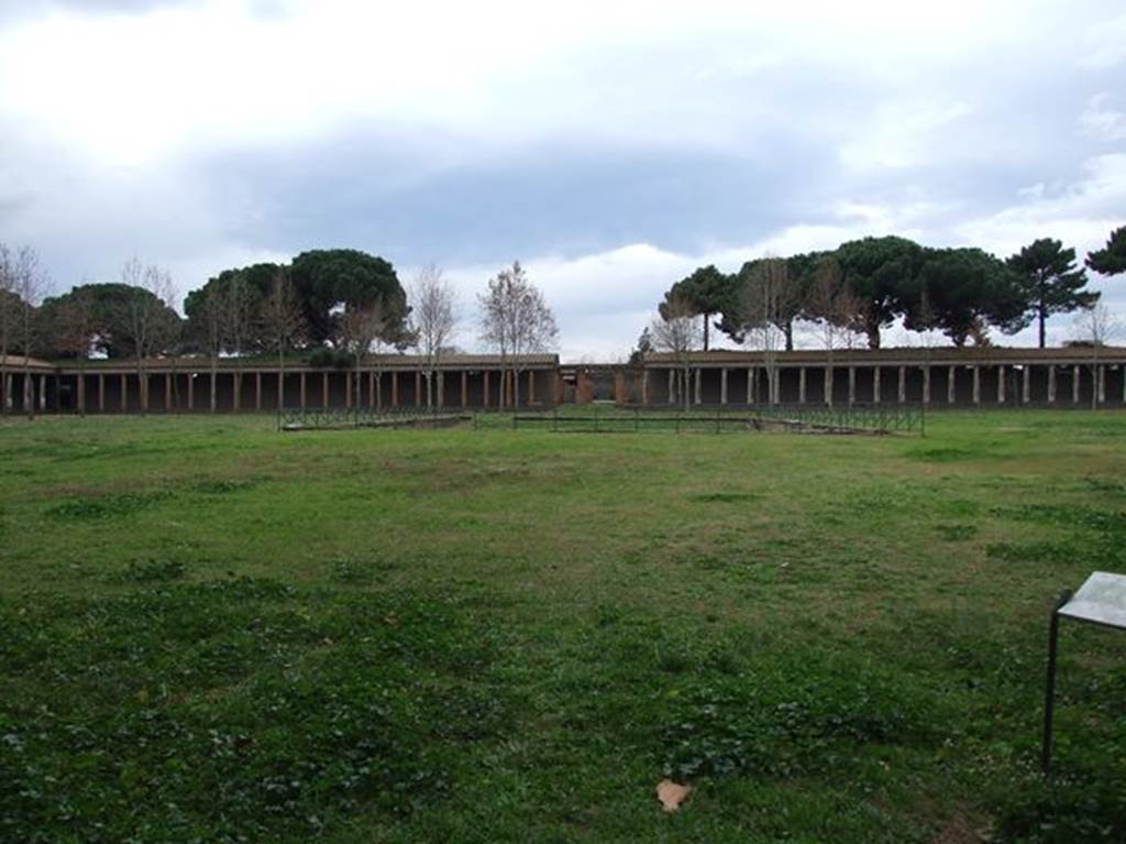 II.7.3 Pompeii. Palaestra. December 2006. View of west side and Piscina or swimming pool.