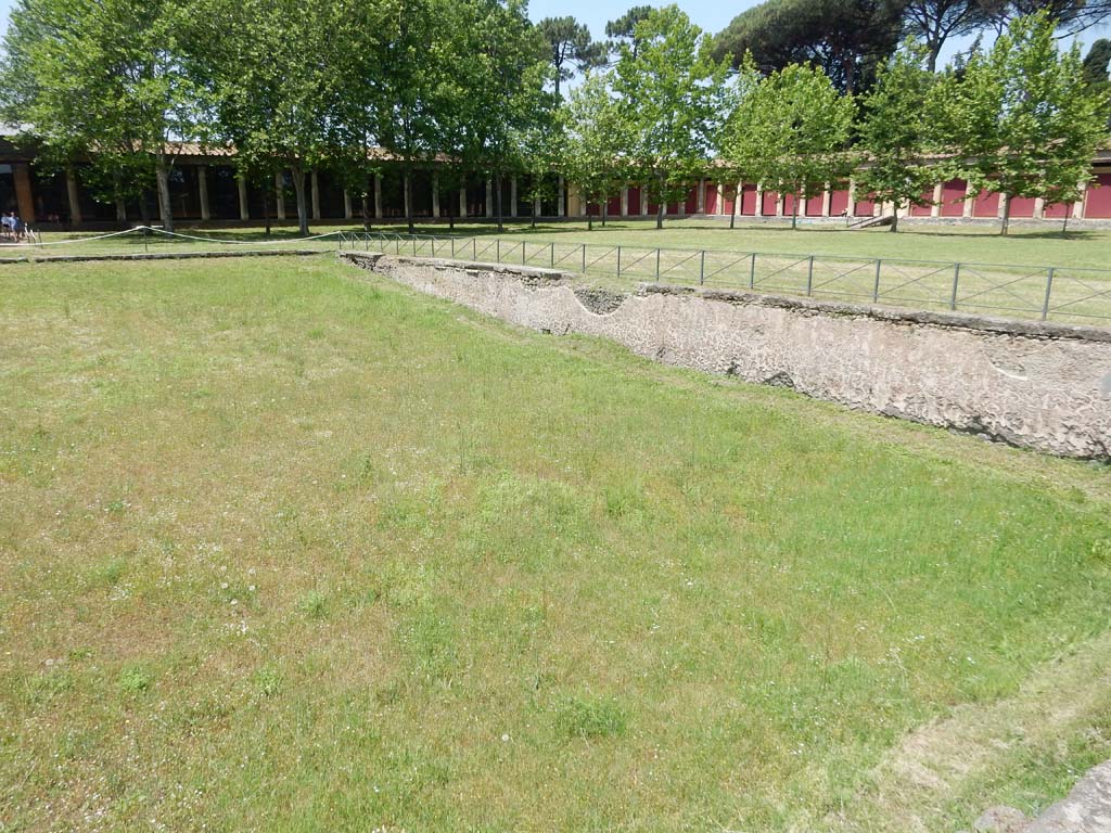 II.7.3 Pompeii. June 2019. Looking across pool to north-west corner of Palestra. Photo courtesy of Buzz Ferebee.