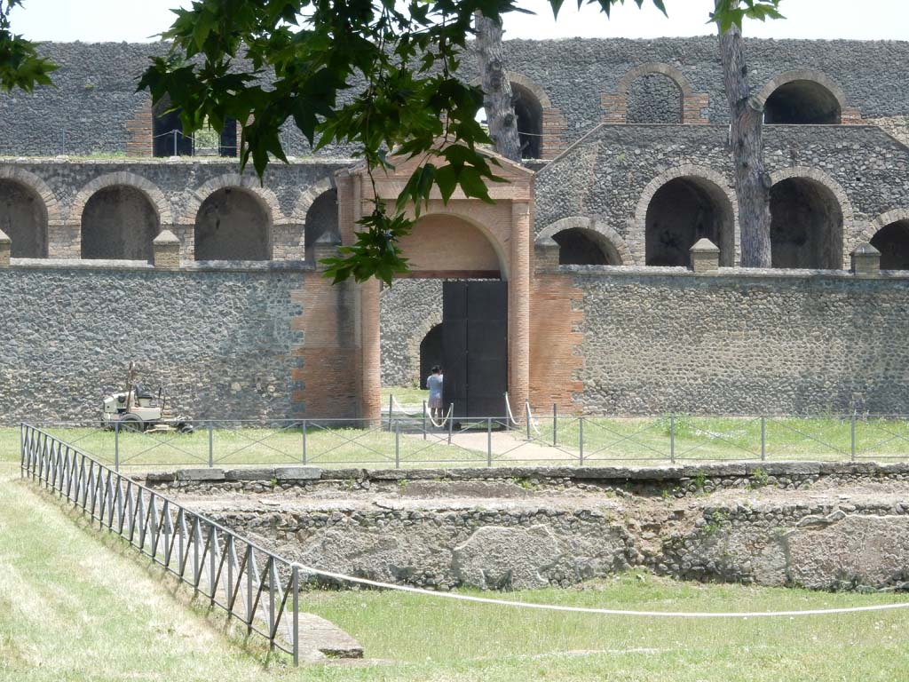 II.7 Pompeii. June 2019. Looking towards north-east corner of pool and doorway at II.7.3. Photo courtesy of Buzz Ferebee.