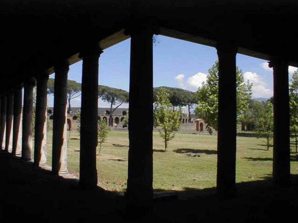 II.7.8 Pompeii. Palaestra. May 2005.Looking across to the east side and Amphitheatre.