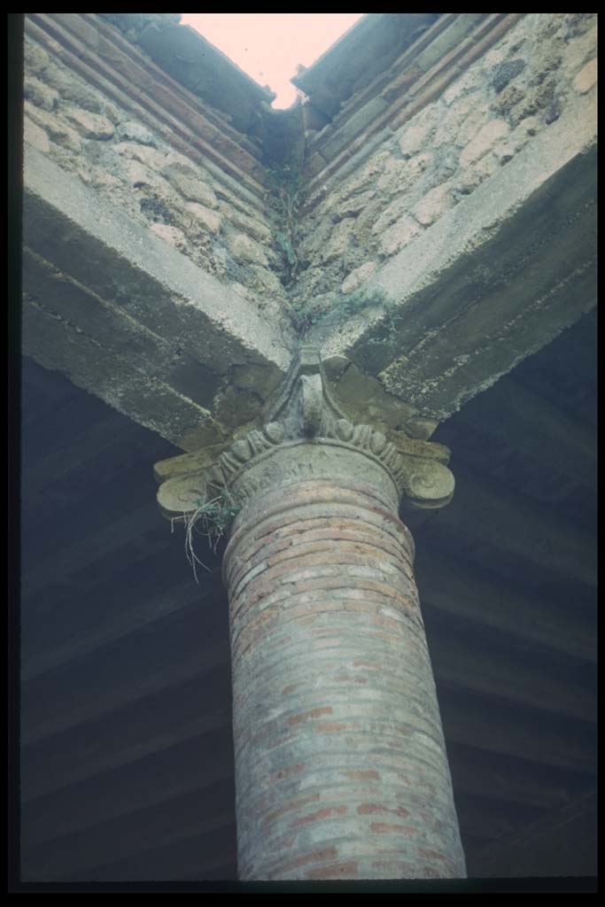II.7.8 Pompeii. Palaestra. Corner column, capital and roof.
Photographed 1970-79 by Günther Einhorn, picture courtesy of his son Ralf Einhorn.
