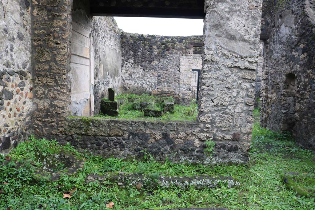 II.8.5 Pompeii. December 2018. 
Looking west in area on south side behind the room with the large window. Photo courtesy of Aude Durand.
