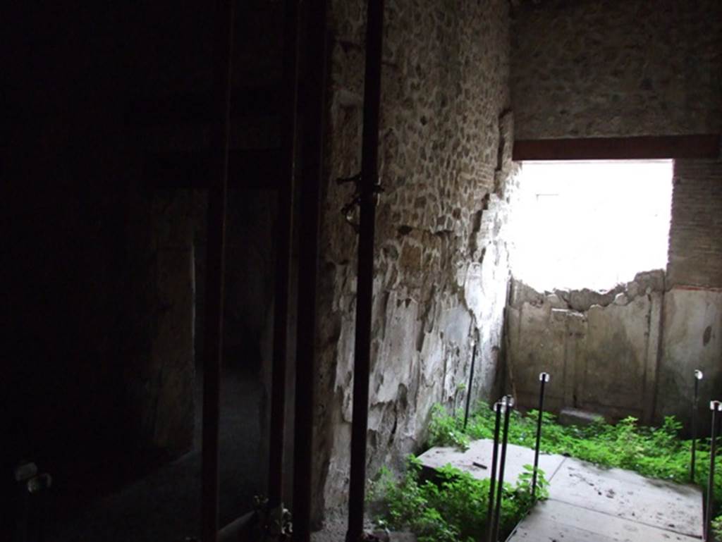 II.9.3 Pompeii. December 2007. Entrance corridor and doorway to room 12 on south side.