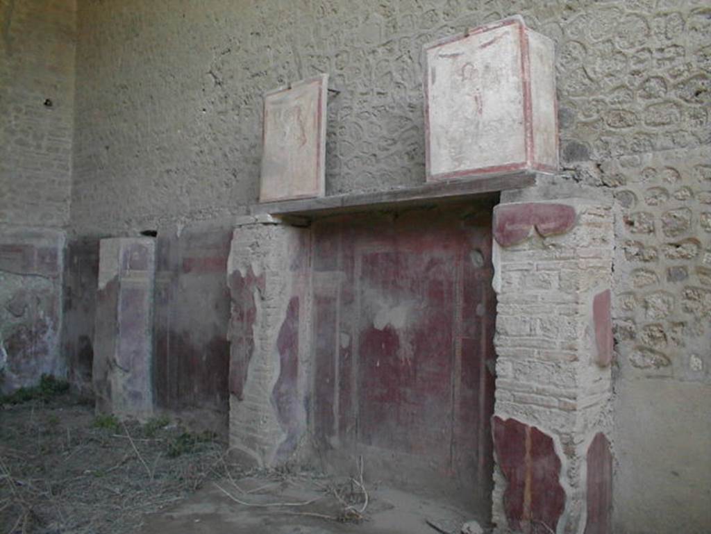 III.3.6 Pompeii.  May 2005.  East wall.  The two paintings, at the top, on the shelf, are from the façade of II.1.12.
