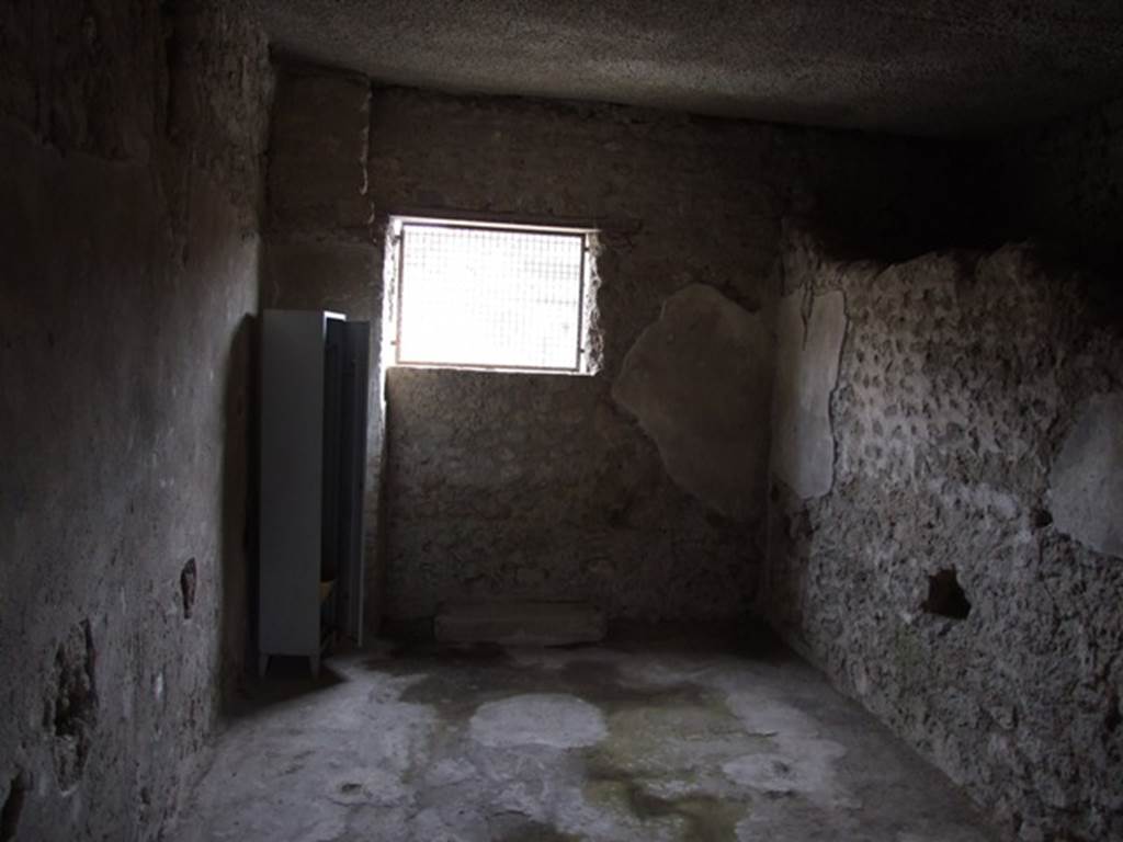 III.4.3  Pompeii.  March 2009.  Room 8.    Looking south towards the original doorway of III.4.3, now a window.