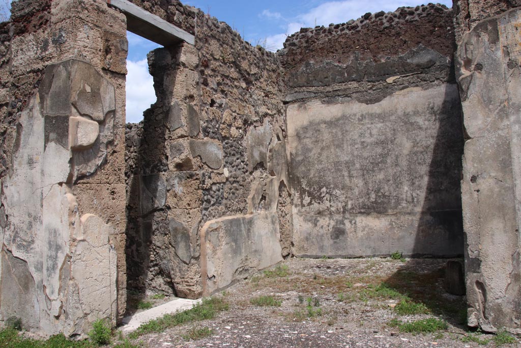 V.1.7 Pompeii. May 2024. 
Room 9, east ala, looking towards north-east corner, with doorway to corridor 10, on left. Photo courtesy of Klaus Heese.
