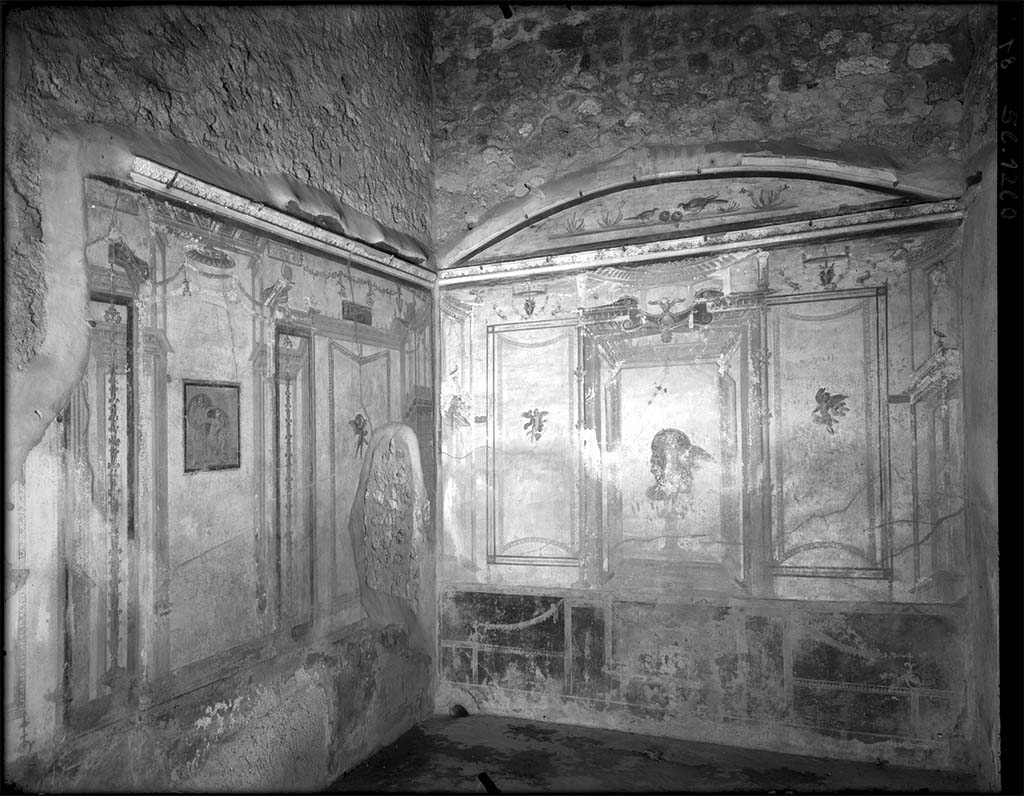 V.2.1 Pompeii. Old undated photograph. Room 8, south-west corner.
In the centre of the south wall (on left) is a painting of Poseidon and Amymone.
In the centre of the west wall (on right) is a painting of Leda and the swan in the central panel.
DAIR 56.1260, Photo © Deutsches Archäologisches Institut, Abteilung Rom, Arkiv. 

