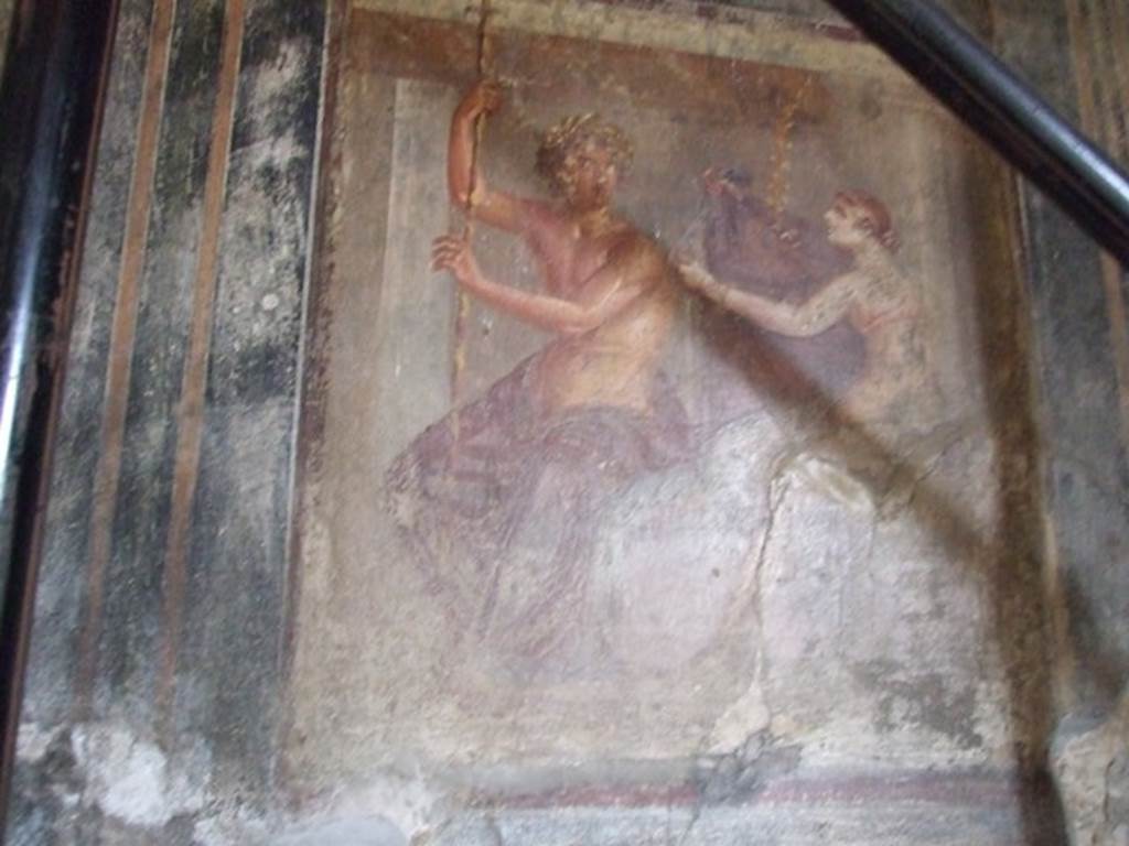 V.2.1 Pompeii.  December 2007.  Room 9,  North wall.  Wall painting of Danae seated on a couch and catching golden rain in her drapery. Next to her is a beardless Zeus in human form.