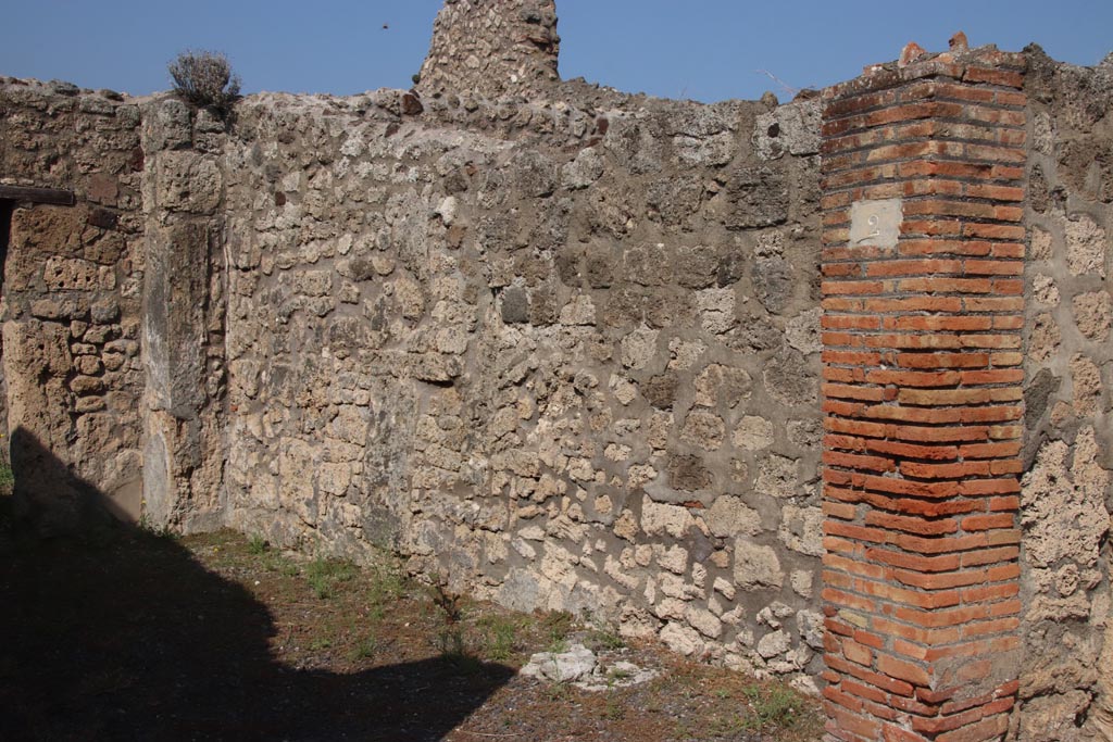 V.2.2 Pompeii. October 2023. Looking north along east wall of shop-room. Photo courtesy of Klaus Heese.