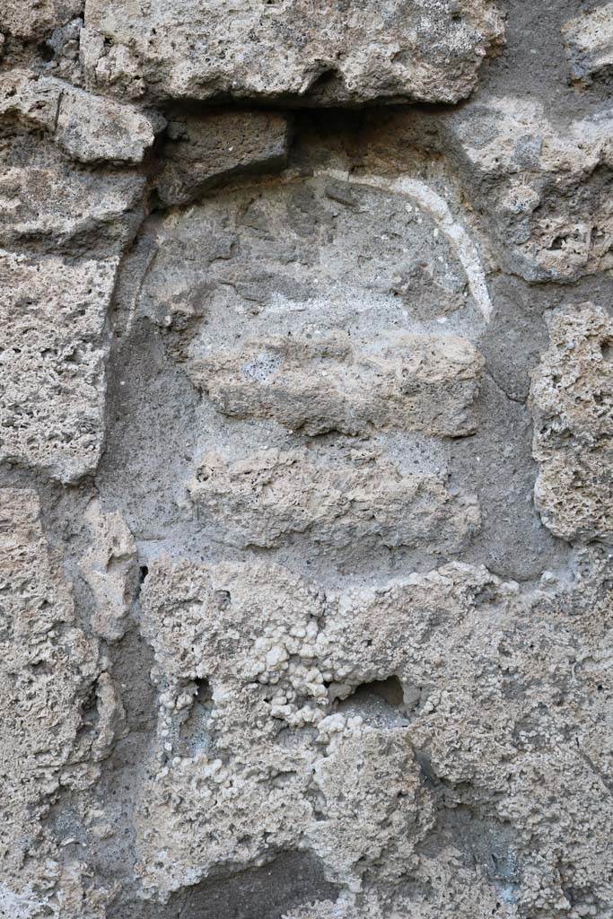 V.2.3, Pompeii. December 2018. 
Remaining niche/recess in west wall of caupona. Photo courtesy of Aude Durand.
