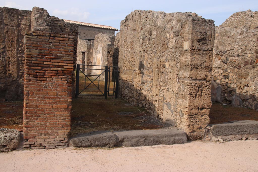 V.2.10 Pompeii. October 2022. Looking north to entrance and doorway through into atrium. Photo courtesy of Klaus Heese.