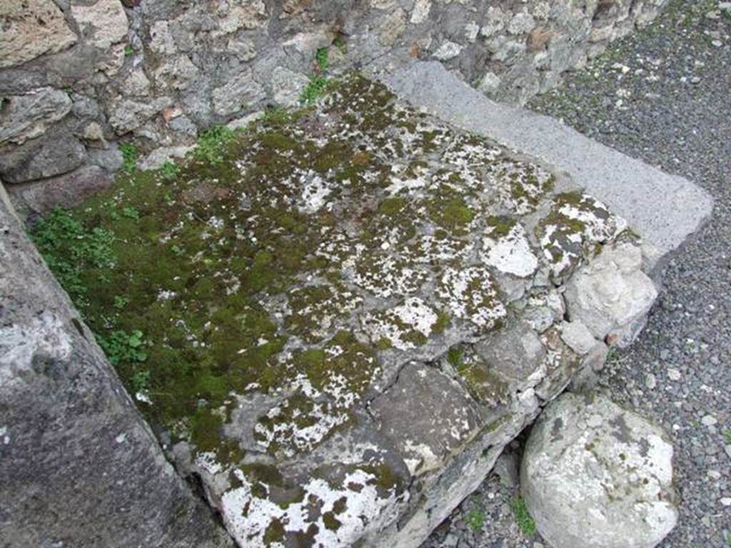 V.2.13 Pompeii. March 2009. South-west corner of thermopolium, and masonry hearth or base.
