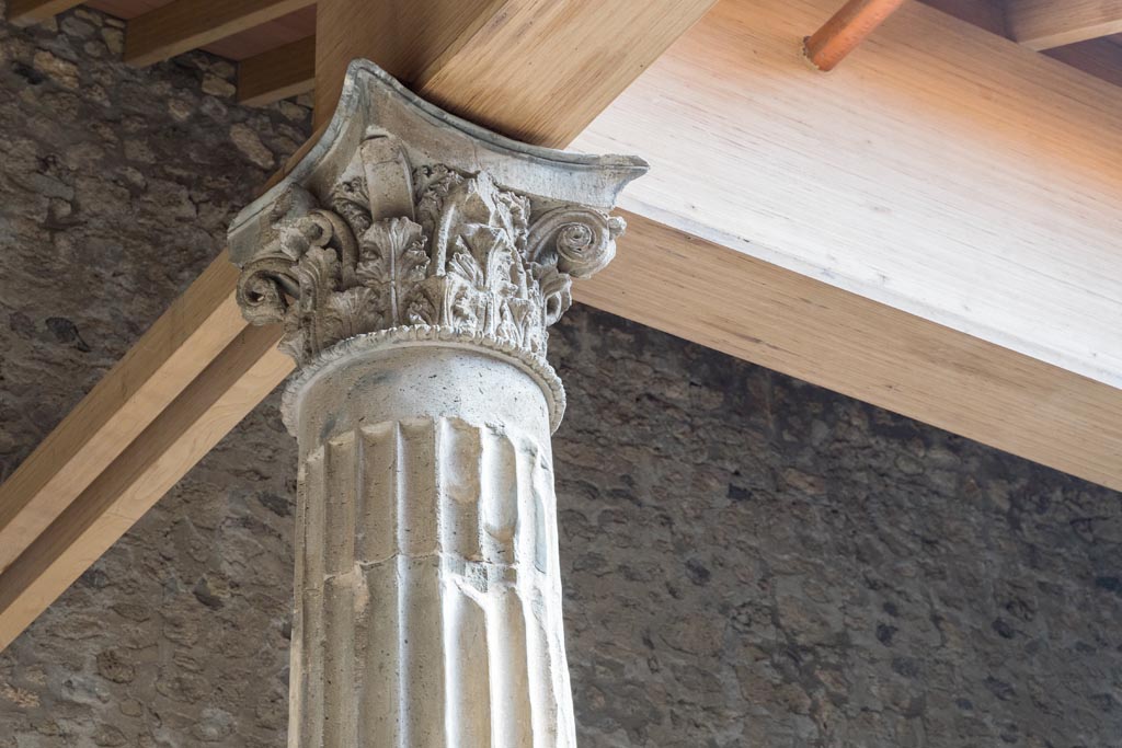 V.2.i Pompeii. March 2023. Detail of capital on top of column at side of impluvium in atrium. Photo courtesy of Johannes Eber.