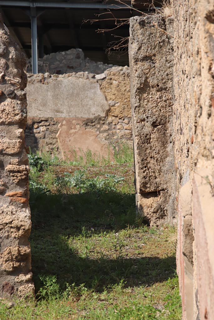 V.3.7 Pompeii. October 2023. 
Looking north along corridor to garden area. Photo courtesy of Klaus Heese.

