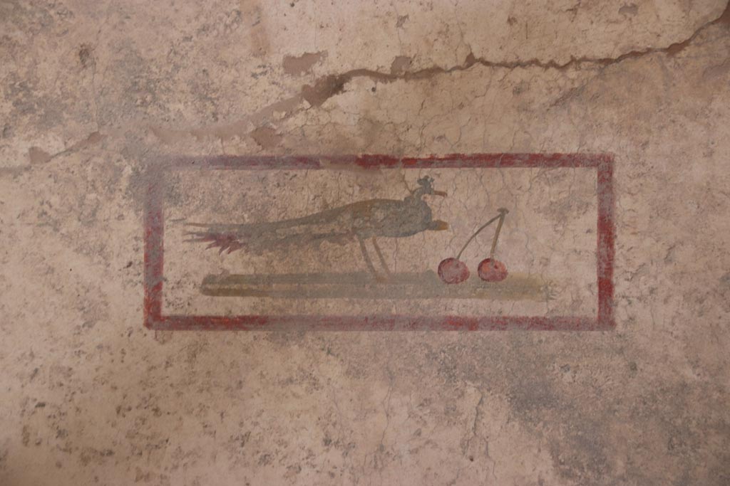 V.3 Pompeii. Casa del Giardino. October 2022.
Room 7, detail of painted panel from centre of east wall. Photo courtesy of Klaus Heese.
