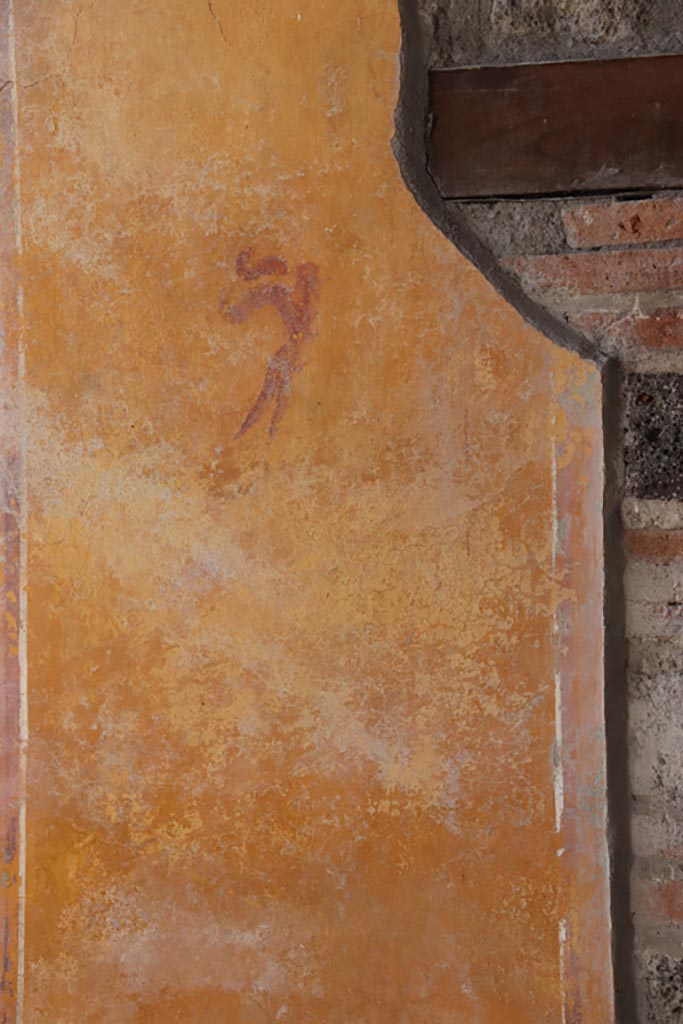 V.3 Pompeii. Casa del Giardino. October 2022. 
Portico 10, looking towards west wall at south end of doorway to room 7, painted decoration.
Photo courtesy of Klaus Heese. 
