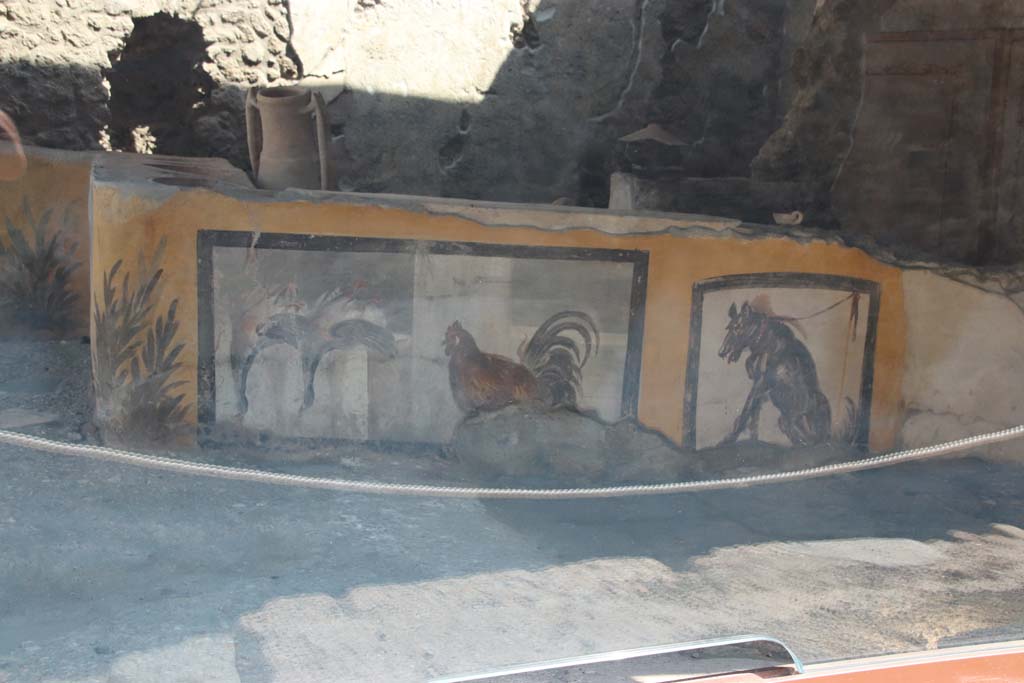 V.3 Pompeii, Thermopolium with painting of nereid. September 2021. 
Looking east to west painted side of counter in bar-room. Photo courtesy of Klaus Heese.
