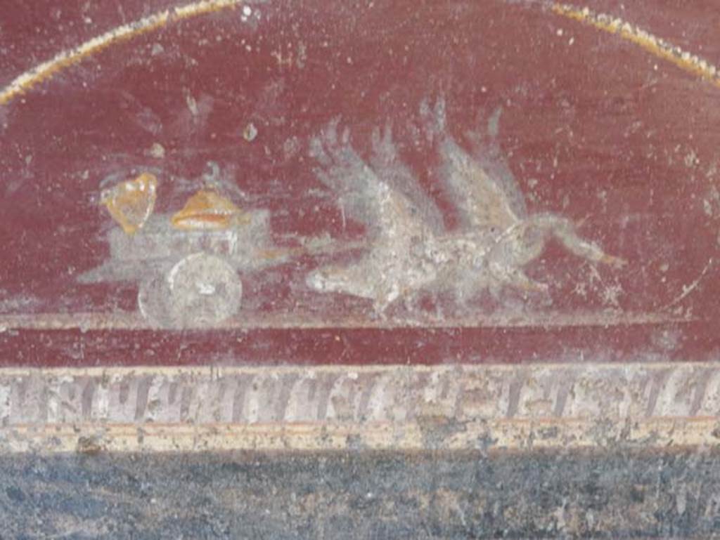 V.4.a Pompeii. May 2015. Detail two swans pulling chariot with cymbals, from predella at west end of south wall in tablinum. Photo courtesy of Buzz Ferebee.
