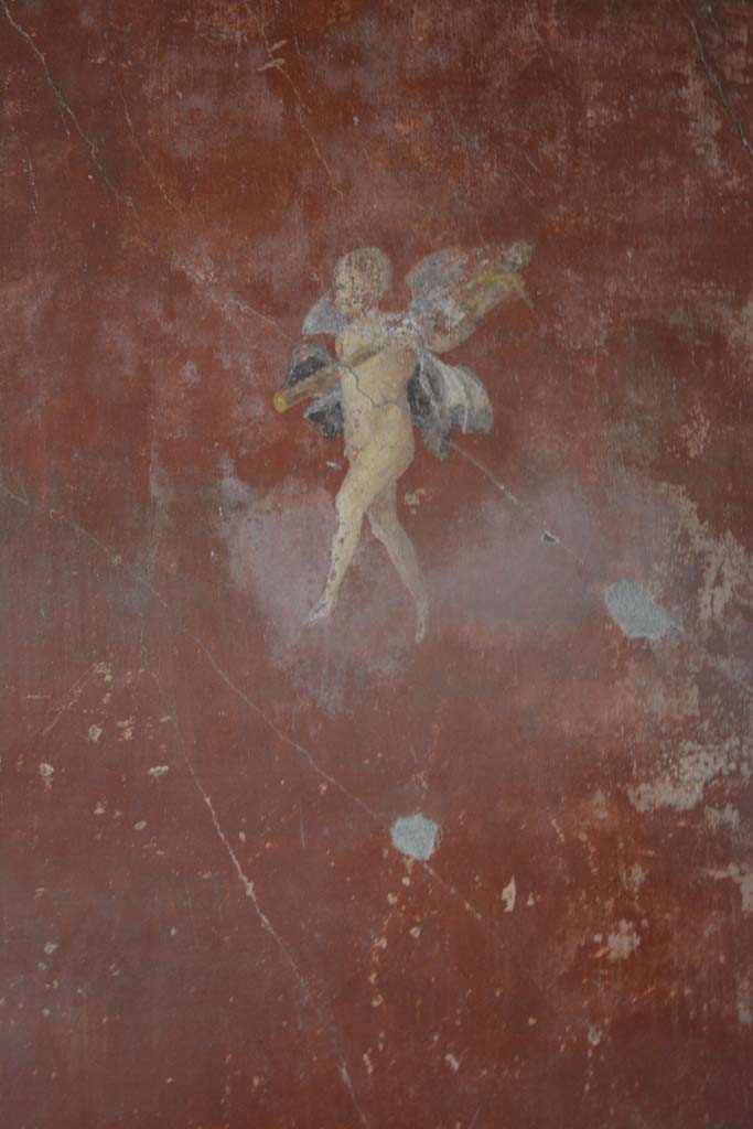 V.4.a Pompeii. March 2019. 
Room ‘f’, detail of painted figure from panel at south end of east wall.
Foto Annette Haug, ERC Grant 681269 DÉCOR.
