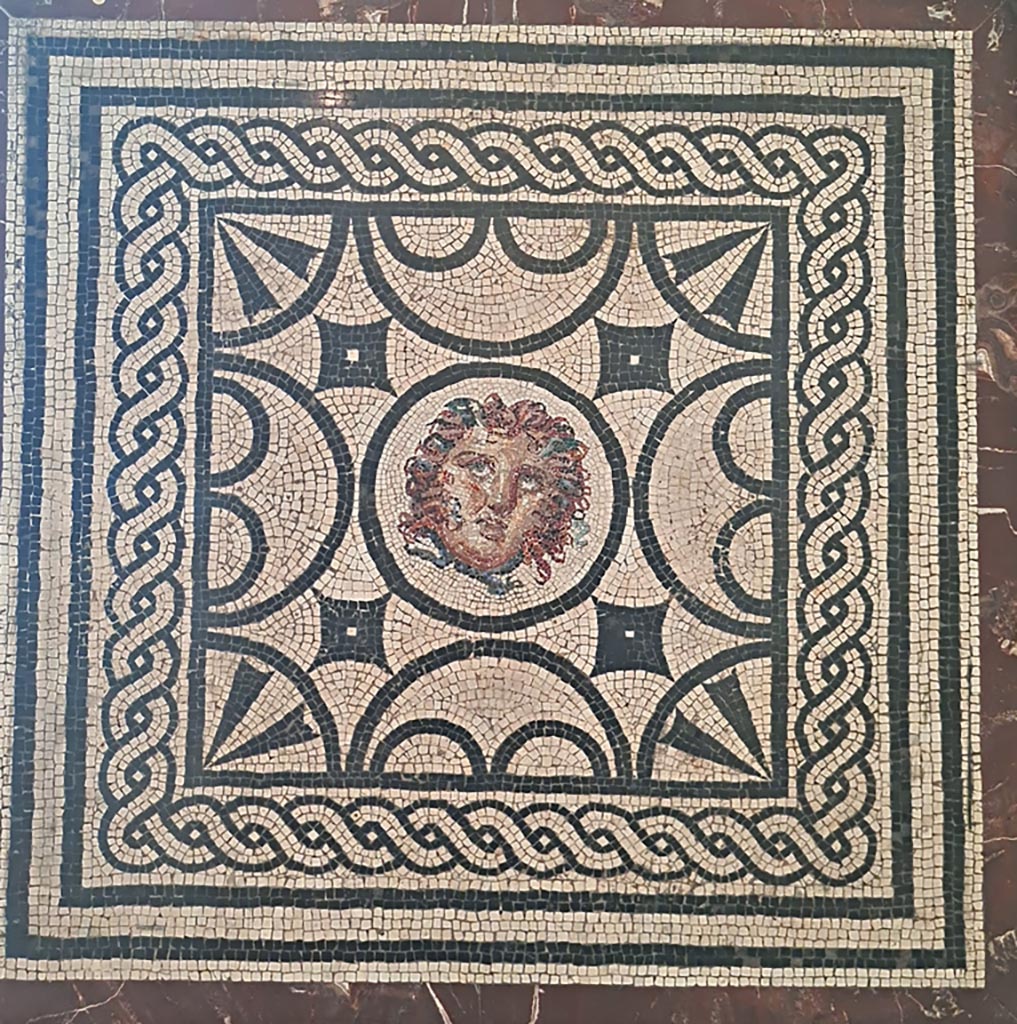 VI.1.7 Pompeii. September 2024. Emblema mosaic with head of Medusa. Photo courtesy of Giuseppe Ciaramella.
Now in Naples Archaeological Museum. Inventory number s. n.
