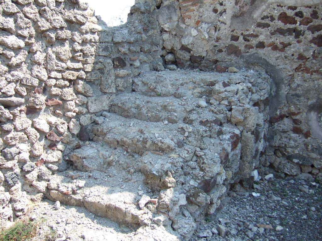 VI.2.29 Pompeii. September 2005. Room 3. Looking south to steps to upper floor, immediately to south of entrance doorway.