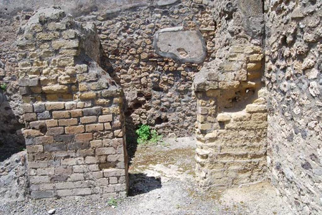 VI.3.20 Pompeii. May 2013. Looking into rear room in north-east corner of bar-room.
Photo courtesy of Paula Lock.
