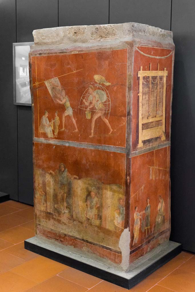 VI.8.20 Pompeii. July 2021. 
Looking towards front and side of pillar with fullonica scenes. Photo courtesy of Johannes Eber.
Now in Naples Archaeological Museum. Inventory number 9974.

