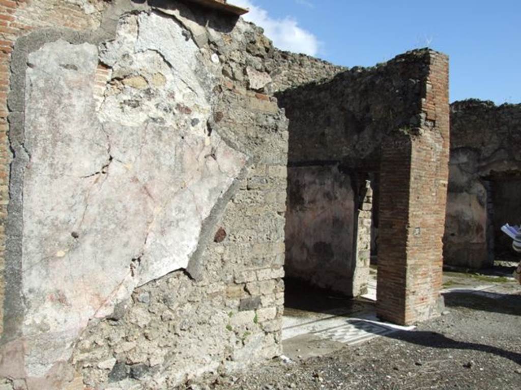 VI.8.20 Pompeii. March 2009. Room 4, east wall of peristyle area, and doorway to room 5.