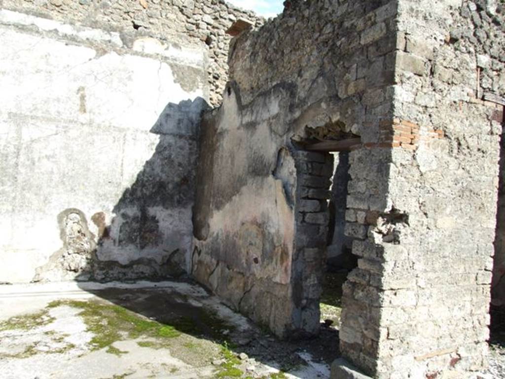 VI.8.20 Pompeii. March 2009. Room 6, east wall (left) and south wall with doorway to room 7.
According to PPM –
“On the east wall, now however, no longer visible, a painting was interpreted as Admetus (PAH II, p.162) or better, as Arianna abandoned (Helbig 223).
(Note: PAH II, p.162 – 
“……….. three paintings, in one of which was seen (a new thing) Theseus who had killed the Minotaur; in another on the facing wall, Adonis sitting injured, Venus and a Cupid; and finally in the third, which was on the wall (east wall), it seemed to me that I could see Admetus with the base of a landscape, Naples 3rd June 1826.”)
According to Helbig (223) –
“This was identified by Fiorelli as Admetus, I find this explanation unfounded, the painting was probably identical to 1216 – “Theseus seated with Arianna speaking to him, bemoaning her lot.”

