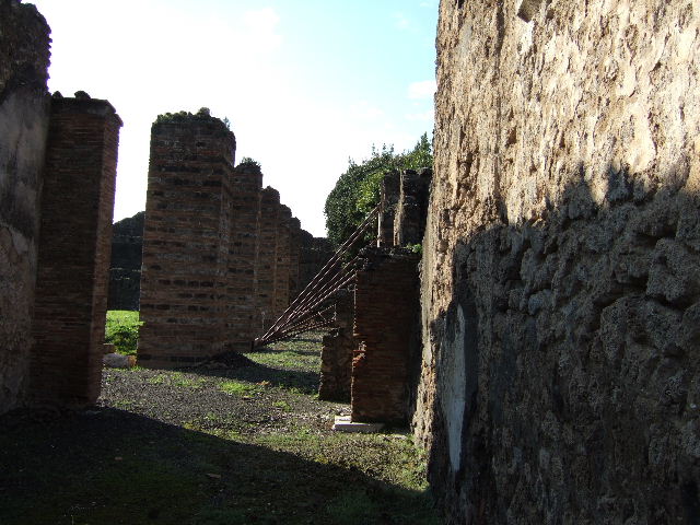 VI.8.20 Pompeii. March 2009. Room 1, entrance corridor. Looking east to entrance doorway at VI.8.20