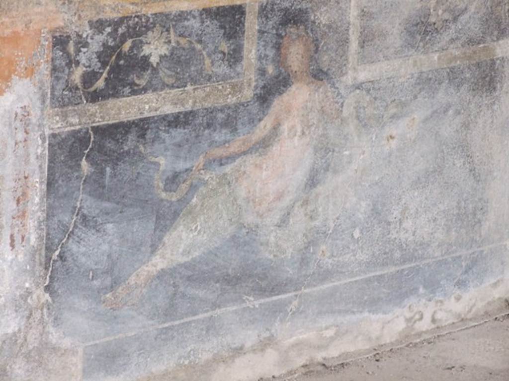 VI.9.2 Pompeii. December 2007. Room 26, south end of east wall, painting of reclining figure.