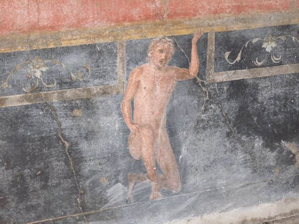 VI.9.2 Pompeii. December 2007. Room 26, centre of east wall, painting of kneeling figure with hand raised.