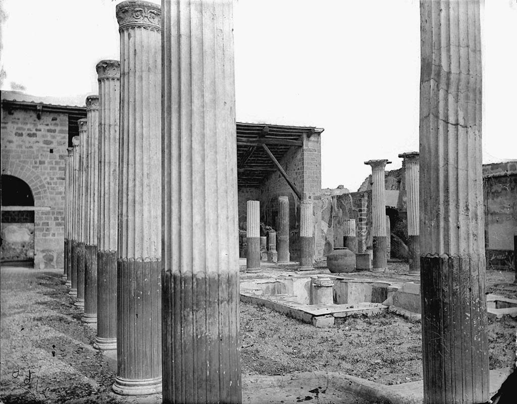 VI.9.2 Pompeii. c. 1871. Looking south-east across pool in peristyle garden 17.
Photo by J. H. Parker, © American Academy in Rome. Parker.2166.Italia.


