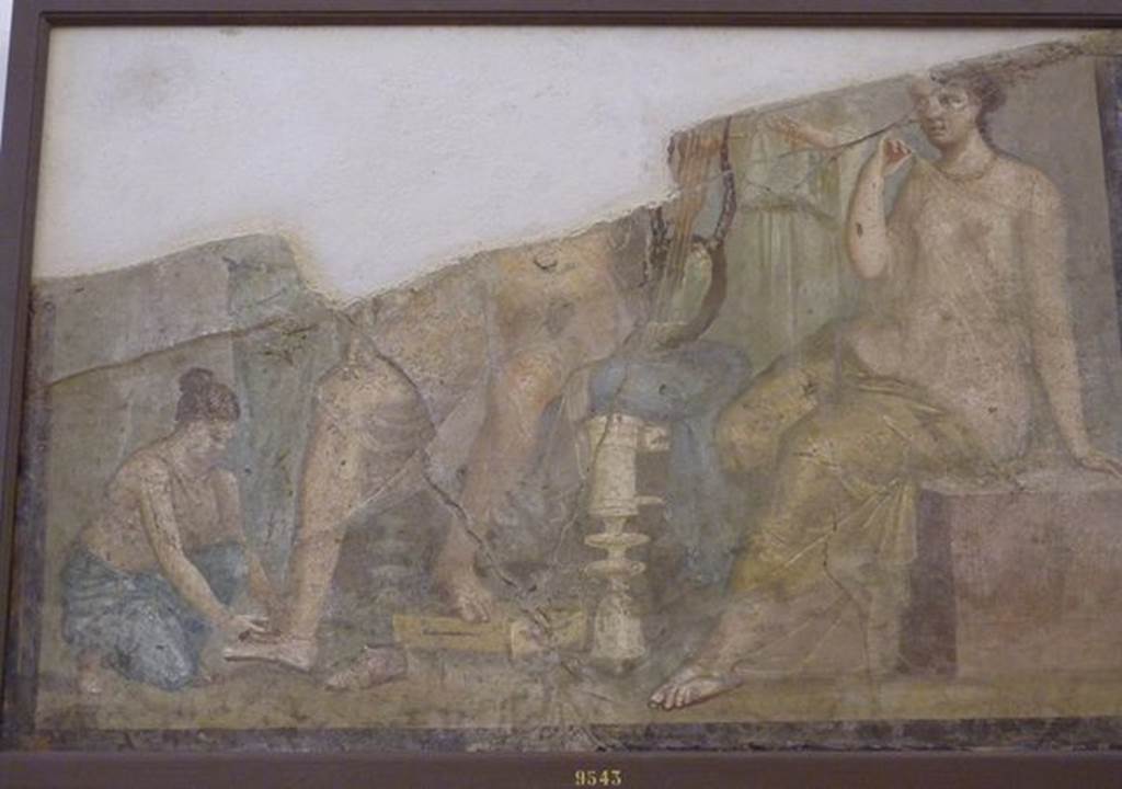 VI.9.2 Pompeii. Found 22nd September 1829 on west end of south wall of room 2, atrium. 
Wall painting of a servant putting the shoes on a man with a lyre. A woman sits at his side and other figures stand in the background. Now in Naples Archaeological Museum. Inventory number 9543.  According to Overbeck-Mau, this painting might have been of Paris and Helen.
See Overbeck J., 1884. Pompeji in seinen Gebäuden, Alterthümen und Kunstwerken. Leipzig: Engelmann. (p.309)
See Helbig, W., 1868. Wandgemälde der vom Vesuv verschütteten Städte Campaniens. Leipzig: Breitkopf und Härtel. (1386b).


