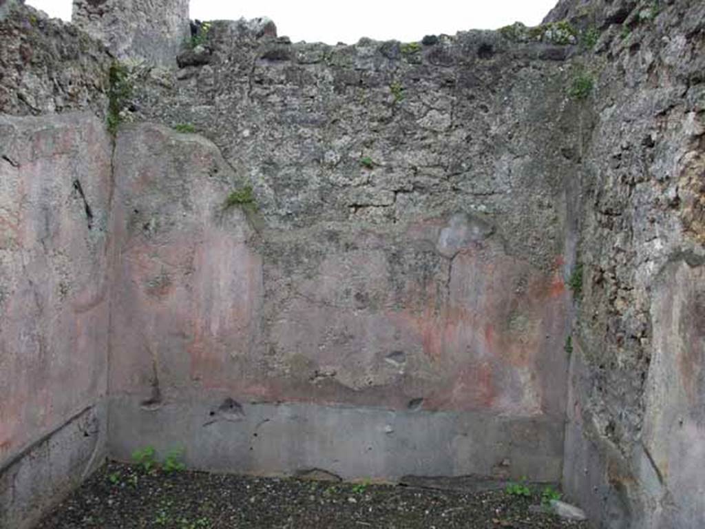VI.9.2 Pompeii. May 2010. Room 12, south wall. According to PPM, this wall was also painted with an aedicula and side-panels in perspective. The painting in the centre of this wall was already described as destroyed, by Overbeck (Pt 4, p.310)
