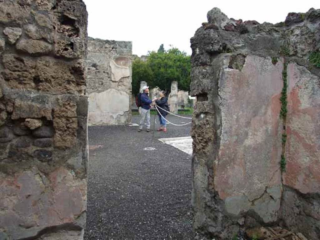 VI.9.2 Pompeii. May 2010. Room 12, north wall with doorway to atrium.