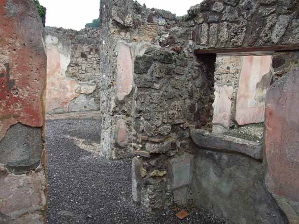VI.9.2 Pompeii. May 2010. Room 14, doorway in north wall to atrium, and north-east corner.