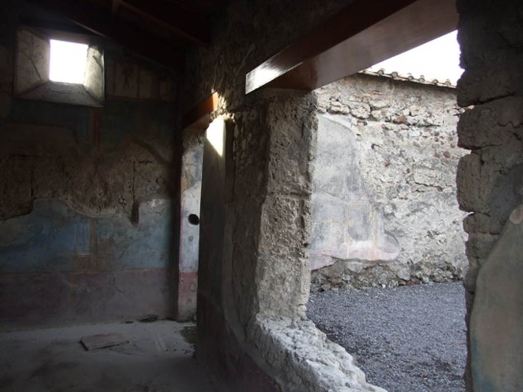 VI.9.2 Pompeii.   December 2007.  Room 29.  North wall with window and door overlooking peristyle.