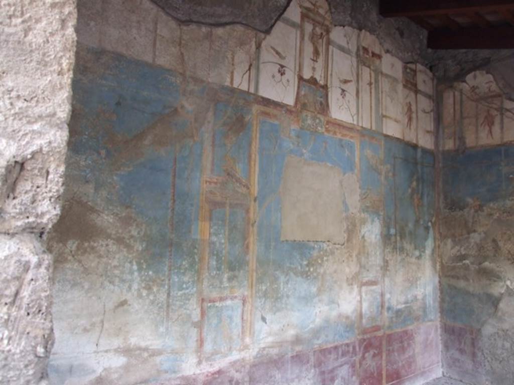 VI.9.2 Pompeii. December 2007. Room 29, south wall with painted wall decoration. In the centre was a painting of Apollo and Mercury (Hermes), now removed.