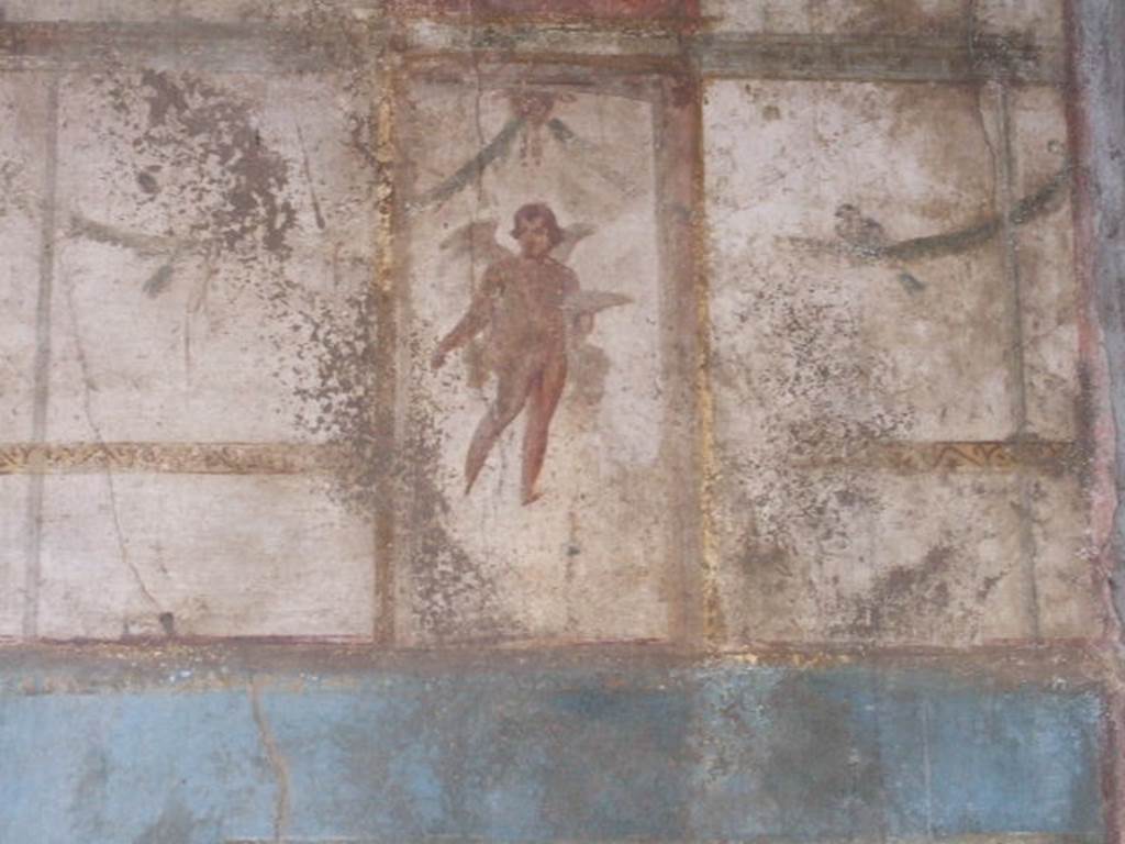 VI.9.2 Pompeii. September 2005. Room 29, painted figure from upper wall at west end of south wall.
