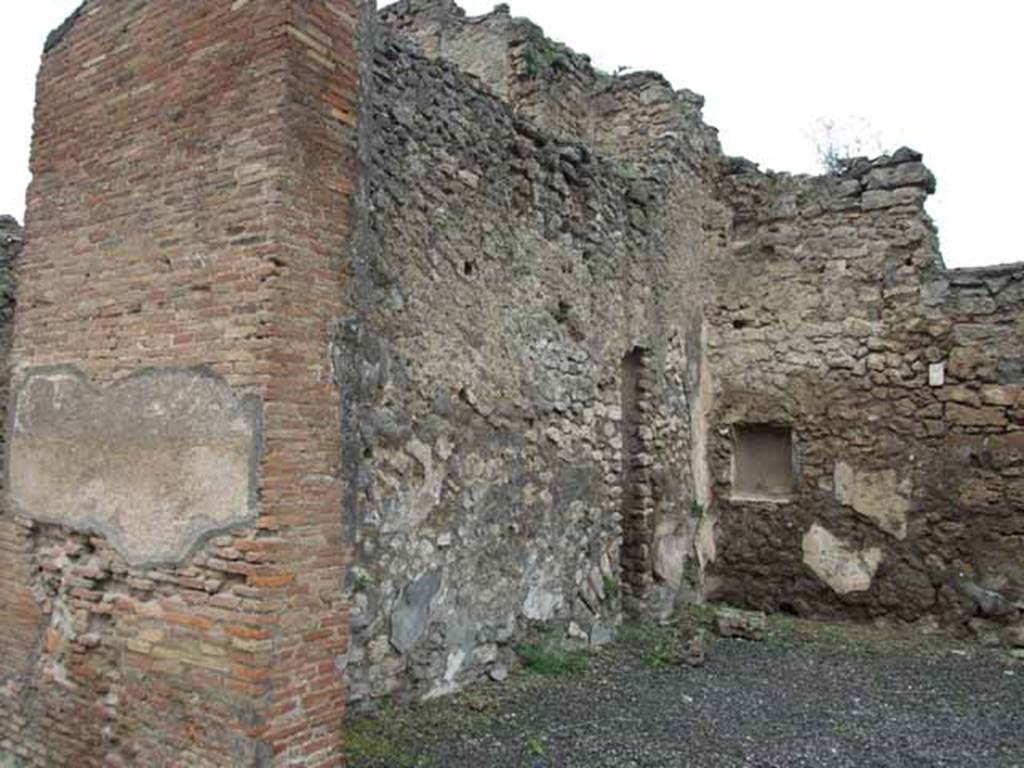 VI.10.13 Pompeii. May 2010. West wall of shop.
