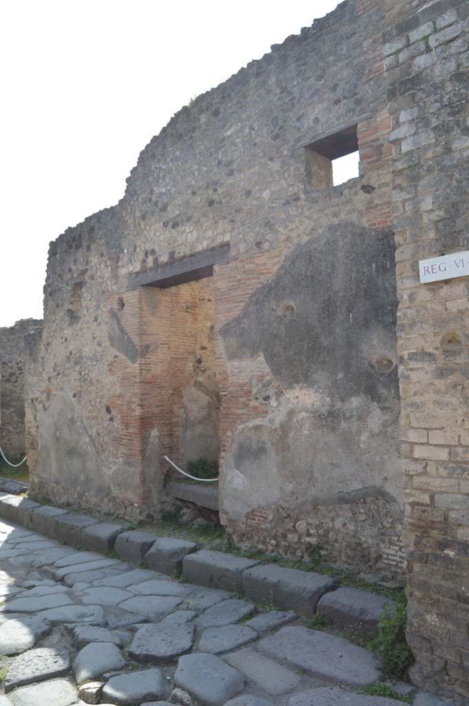 VI.13.16, Pompeii. March 2019. 
Looking south-west to entrance doorway in Vicolo dei Vettii, with water tower, on right. 
Foto Taylor Lauritsen, ERC Grant 681269 DÉCOR.

